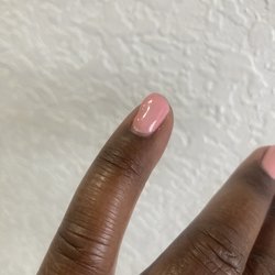 L C Nails & Spa - Lumpy, poorly polished nails that are chipping.