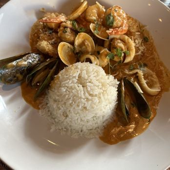 Chicha Peruvian Kitchen Midtown - Mussels, shrimp, fish, clams with rice and a very buttery and creamy sauce. I was hoping it would be spicy but it was not! Delicious - Peruvian Near Me - Sacramento, California