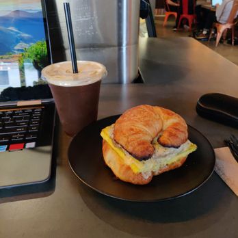 ANTHEM Coffee & Tea | Verrado - Cold brew on nitro and sausage croissant with pepper jack cheese - Coffee & Tea Near Me - Buckeye, Arizona ANTHEM Coffee & Tea | Verrado - Cold brew on nitro and sausage croissant with pepper jack cheese - Coffee & Tea Near Me - Buckeye, Arizona