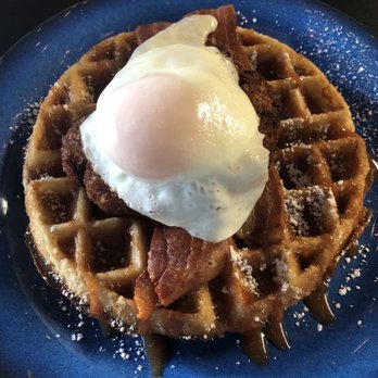 Historias y Un Cafe - Almond chicken & waffle. The chicken was breaded with almond, walnut and coconut on top of bacon strips on top of a delicious waffle. - Breakfast & Brunch Near Me - Bayamón, Puerto Rico Historias y Un Cafe - Almond chicken & waffle. The chicken was breaded with almond, walnut and coconut on top of bacon strips on top of a delicious waffle. - Breakfast & Brunch Near Me - Bayamón, Puerto Rico