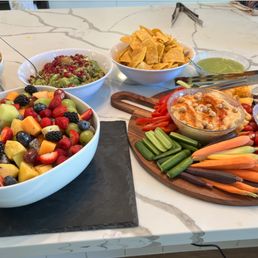 Homemade guac, fruit bowl and crudite platter Homemade guac, fruit bowl and crudite platter