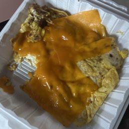 This is the 16. Eastern Omelet .. I just asked for bacon cheese omelet.. Y'all be the judge. This is the 16. Eastern Omelet .. I just asked for bacon cheese omelet.. Y'all be the judge.