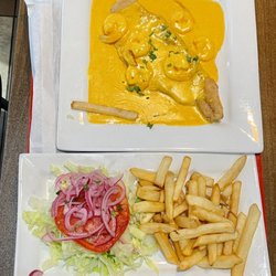 La Granja - Spicy Garlic Fish and Shrimp with Fries and a Side Salad