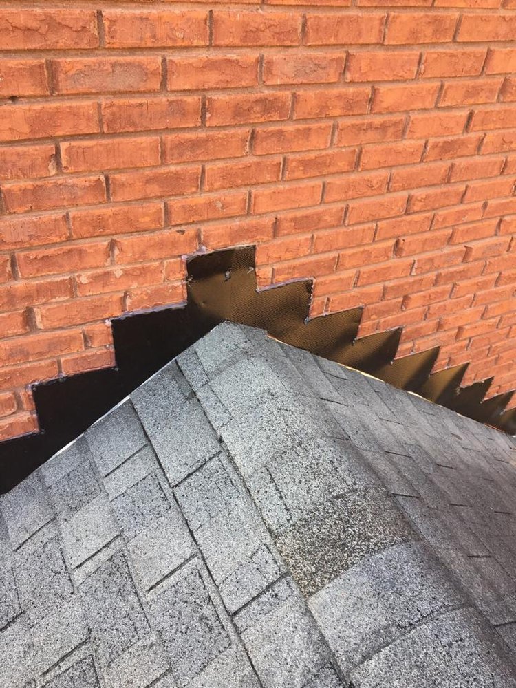 Slide of Rocco’s Roofing