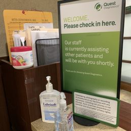 Check in area. Clear instructions. Plenty of Hand Sanitizer