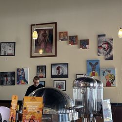 Rising Sun Cafe - A wall full of local art