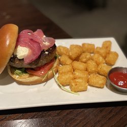 Wood N Tap - "Lamb Harissa Burger" (mint aioli, arugula, tomato topped with feta cheese and pickled red onions) with Parmesan Tater Tots