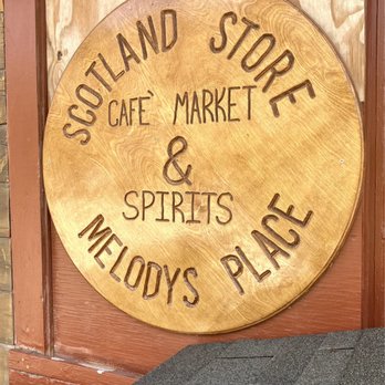 Melody's Place - a wooden sign for a cafe - Bars Near Me - Lytle Creek, California
