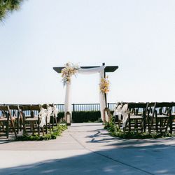 Damian Party Rentals - Fruit Wood Chairs and Rustic Wedding Arch