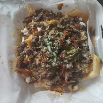 Chow Me Down - I had to try the carne asada fries two times before I said this. They have a watering non flavorful taste. - Food Trucks Near Me - Pascagoula, Mississippi