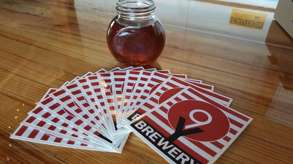 Photo of Nine Yards Brewing - Kenmore, WA, US. Taster of Homewrecker Red and stickers :)