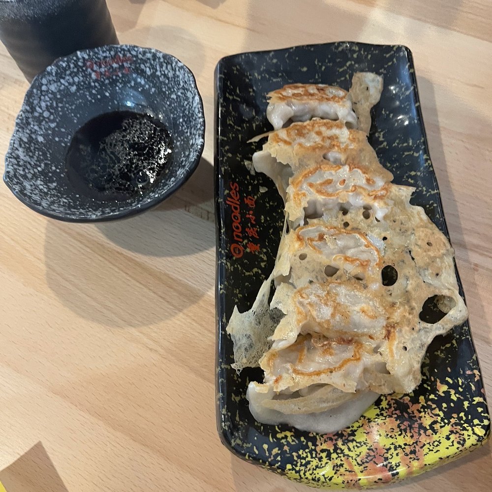 Q Noodles - Chicken and mushroom pan fried dumplings. - Noodles Near Me - Cary, North Carolina Q Noodles - Chicken and mushroom pan fried dumplings. - Noodles Near Me - Cary, North Carolina