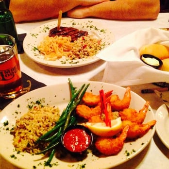 Timber Lodge - Golden Fried Shrimp hand-breaded in Japanese bread crumbs w string bean and herb rice. 10oz Center Cut Top Sirloin w herb rice. - Steakhouses Near Me - Medina, Ohio Timber Lodge - Golden Fried Shrimp hand-breaded in Japanese bread crumbs w string bean and herb rice. 10oz Center Cut Top Sirloin w herb rice. - Steakhouses Near Me - Medina, Ohio