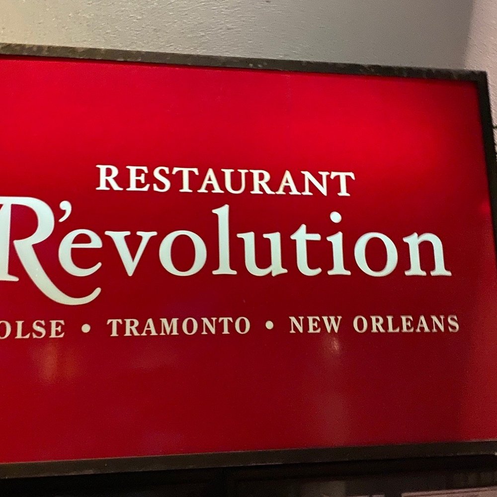 a sign for a restaurant a sign for a restaurant