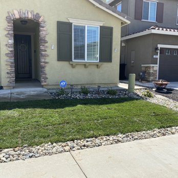 Chapman Landscape Development - New sod and rocks - General Contractors Near Me Chapman Landscape Development - New sod and rocks - General Contractors Near Me