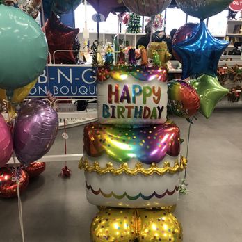 Party City - a birthday cake with balloons in the background - Party Supplies Near Me - Bridgewater, New Jersey Party City - a birthday cake with balloons in the background - Party Supplies Near Me - Bridgewater, New Jersey