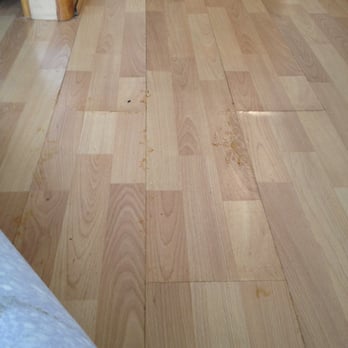 Absolutely Spotless - Water STILL coming up, the brown I'm guessing is from the wood laminate deteriorating - Home Cleaning Near Me - Las Vegas, Nevada