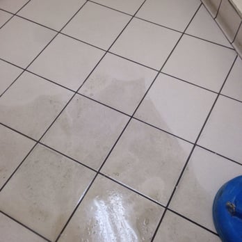 Carpet Cleaning Windermere - Look at the difference of the color versus the tile that wasn't cleaned yet. Totally incredible. - Carpet Cleaning Near Me - Windermere, Florida Carpet Cleaning Windermere - Look at the difference of the color versus the tile that wasn't cleaned yet. Totally incredible. - Carpet Cleaning Near Me - Windermere, Florida