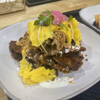 Foko - chilaquiles with chicken, chorizo, and the eggs scrambled - Breakfast & Brunch Near Me - Louisville, Kentucky Foko - chilaquiles with chicken, chorizo, and the eggs scrambled - Breakfast & Brunch Near Me - Louisville, Kentucky