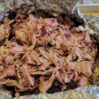 Charcoal Craze - Pulled Pork:
Dry rubbed pork shoulder, slow-smoked for 9 hours. It is cooked until it's tender. Pulls apart easier than a fluffy doughnut. - Food Stands Near Me