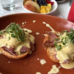 Smoked meat Benny with fruit salad. Smoked meat Benny with fruit salad.