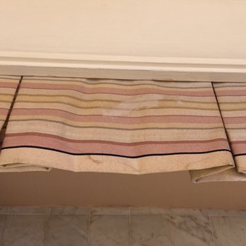 Spindrift Inn - Decorative headliner in the bathroom above the tub that is stained and old.  Yuk. - Hotels Near Me - Monterey, California