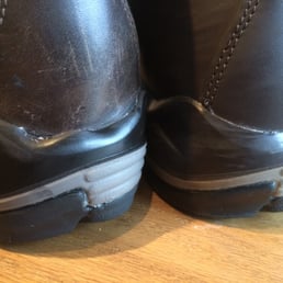 A new boot (with factory sole) on the right.  A re-sole on the left from Resole America.  Hope the picture comes through okay!