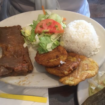 Isla Del Encanto - Pastel de puerco con arroz blanco, tostones,y ensalada! - Puerto Rican Near Me - Miami, Florida Isla Del Encanto - Pastel de puerco con arroz blanco, tostones,y ensalada! - Puerto Rican Near Me - Miami, Florida