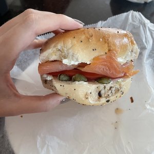 Photo of Rosenfeld Bagel - Newton, MA, United States. Hand for scale