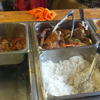 El Sabor de la Isla - Lots of choices, and an orange towel. This is Rochester dude. Not Syracuse. - Caribbean Near Me - Rochester, New York
