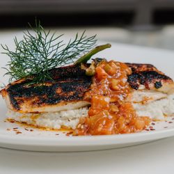 Commerce Kitchen - Blackened redfish with parmesan grits, grilled okra and a creamy creole sauce
