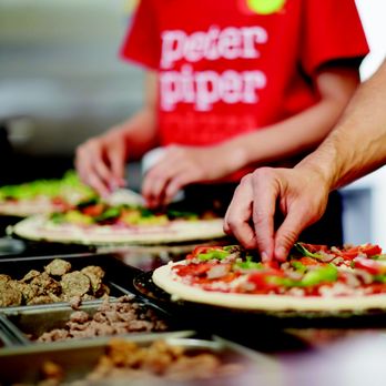Peter Piper Pizza - two people making pizzas - Pizza Near Me - Palmview, Texas Peter Piper Pizza - two people making pizzas - Pizza Near Me - Palmview, Texas