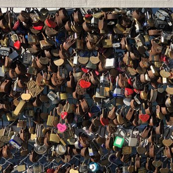 The Funnel House - many padlocks attached to a fence - Desserts Near Me - Long Beach, California The Funnel House - many padlocks attached to a fence - Desserts Near Me - Long Beach, California