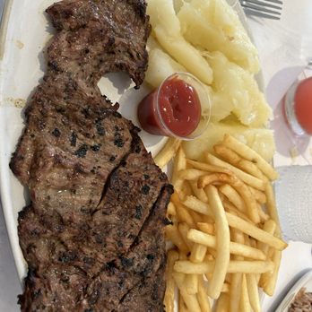 Madrono Restaurant - Carne asada with boiled yucca and fries - Latin American Near Me - Miami, Florida Madrono Restaurant - Carne asada with boiled yucca and fries - Latin American Near Me - Miami, Florida
