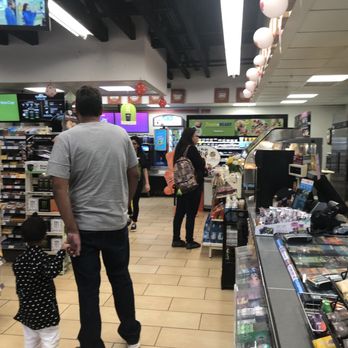 7-Eleven - people shopping in a grocery store - Convenience Stores Near Me - Surrey, British Columbia