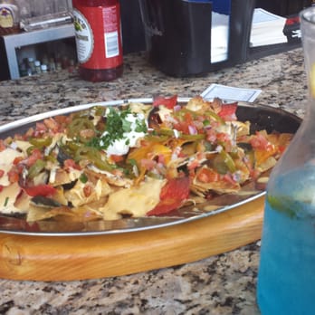 Saddle Ranch - A wonderful tasting plater of nachos - Steakhouses Near Me - Orange, California Saddle Ranch - A wonderful tasting plater of nachos - Steakhouses Near Me - Orange, California