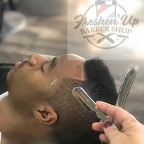 Finishing up Brandon's haircut with a professional straight razor line up. - Haircut is a $25 service. Finishing up Brandon's haircut with a professional straight razor line up. - Haircut is a $25 service.