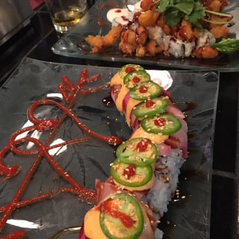 QQ Sushi & Kitchen - Specials: Seahawk roll in front and Gonzaga roll in back. SO DELICIOUS! - Sushi Bars Near Me - Spokane, Washington