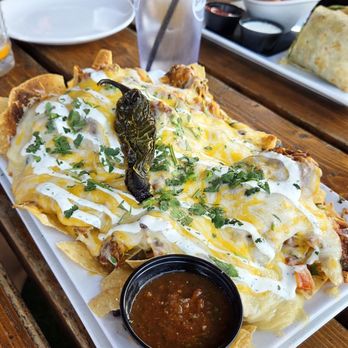 The Porch - Grande Chicken Tinga Nachos. - Bars Near Me - Gilbert, Arizona