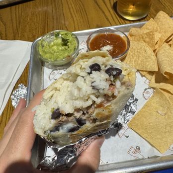 Tipsy Putt  - Mission burrito (with guacamole on the side). It's mostly white rice for the first half of the burrito. - Pubs Near Me - Monterey, California