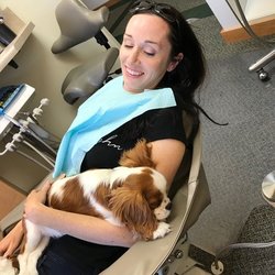 Ashland Family Dentistry - One of our patients with one of our therapy dogs. By appointment only!