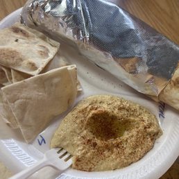 Chicken Tandoori wrap with hummus and chips Chicken Tandoori wrap with hummus and chips