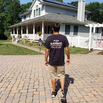 BlackHawk Security Tech - Chris getting ready to operate., nice shirt. - Security Systems Near Me