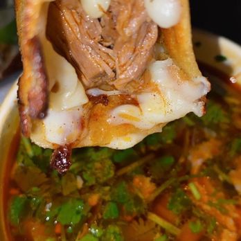 Tacos La Mordida - Taco de Birria w/ green chile & broth - Food Trucks Near Me