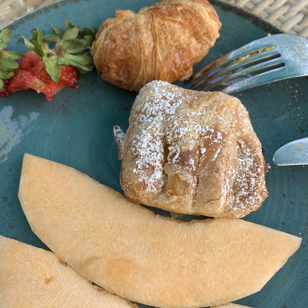 SHOR - Tiny pastries and melon that isn't quite ripe. - Breakfast & Brunch Near Me - Honolulu, Hawaii SHOR - Tiny pastries and melon that isn't quite ripe. - Breakfast & Brunch Near Me - Honolulu, Hawaii