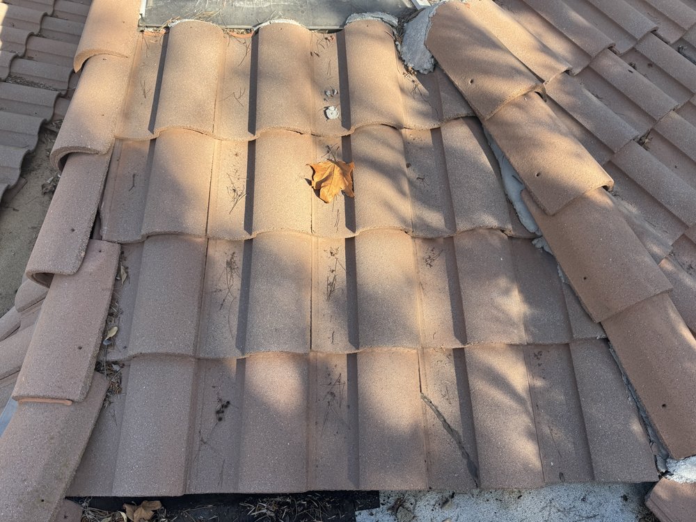 Slide of Dilligent Roofing