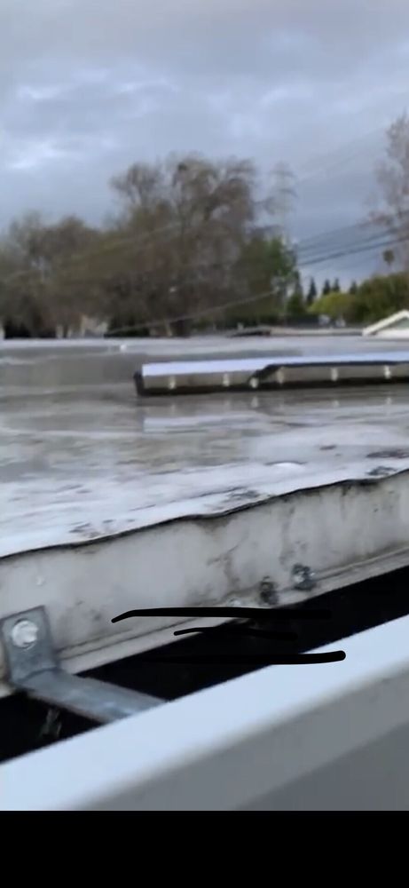 Slide of T D Roofing