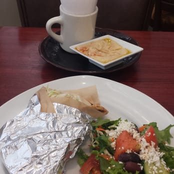 Pom & Olive - Pita fries (top) and falafel sandwich with a Mediterranean salad (bottom). - Mediterranean Near Me - Costa Mesa, California