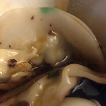 Gu's Dumplings - Fluorescent green spot on dumpling. - Szechuan Near Me - Atlanta, Georgia