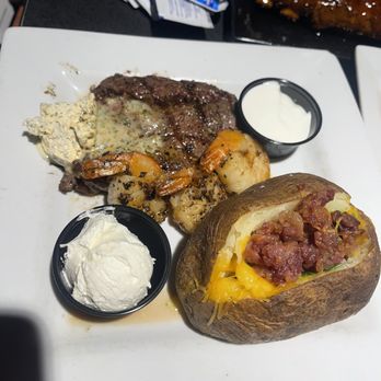 Black Rock Bar & Grill - Steak shrimp loaded potato - Bars Near Me - Beavercreek, Ohio